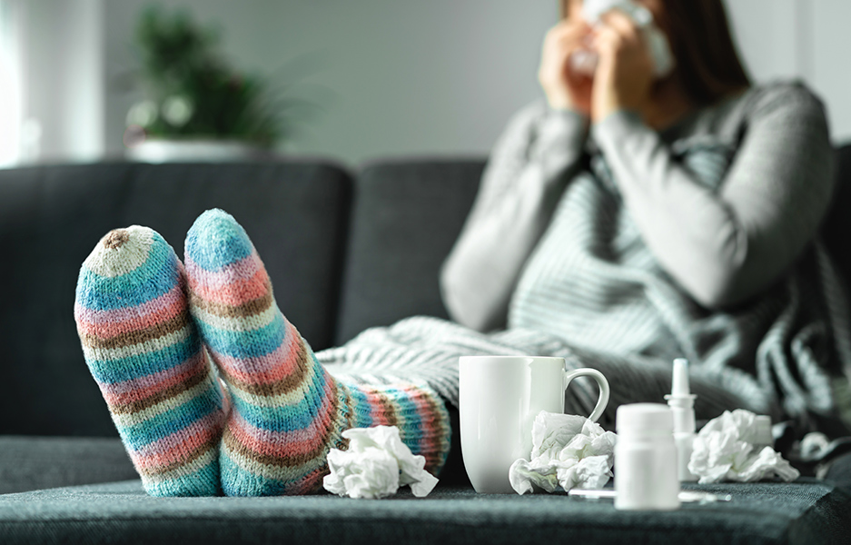 a woman blowing her nose